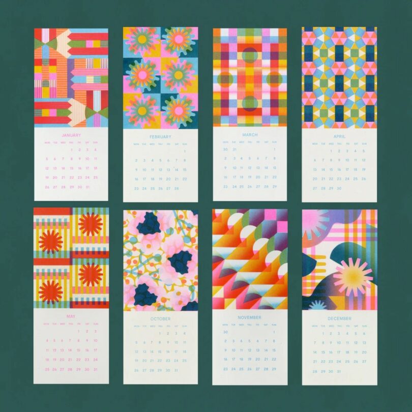 A 2024 wall calendar with each month featuring a unique, colorful geometric or floral pattern above the calendar grid