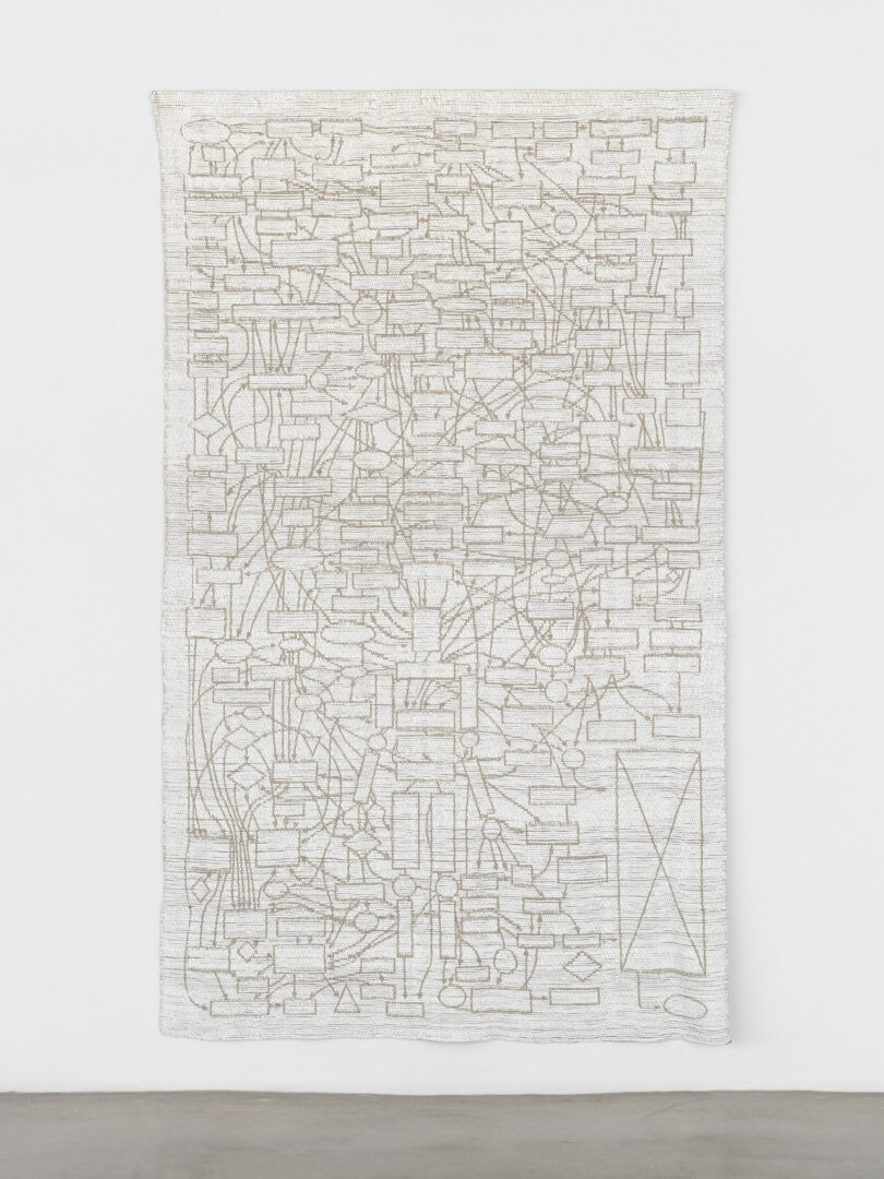 white vertical tapestry using woven white paint
