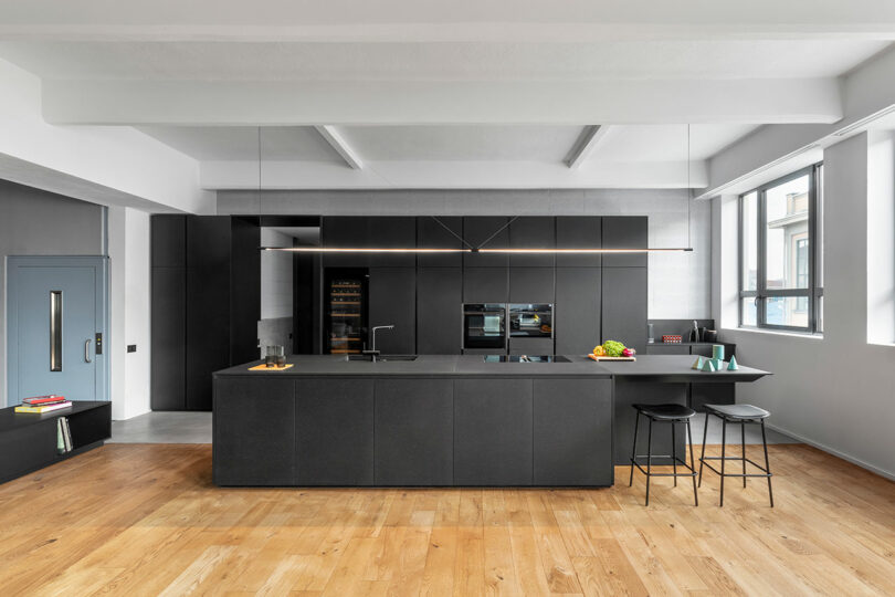 interior shot of modern industrial loft showing kitchen
